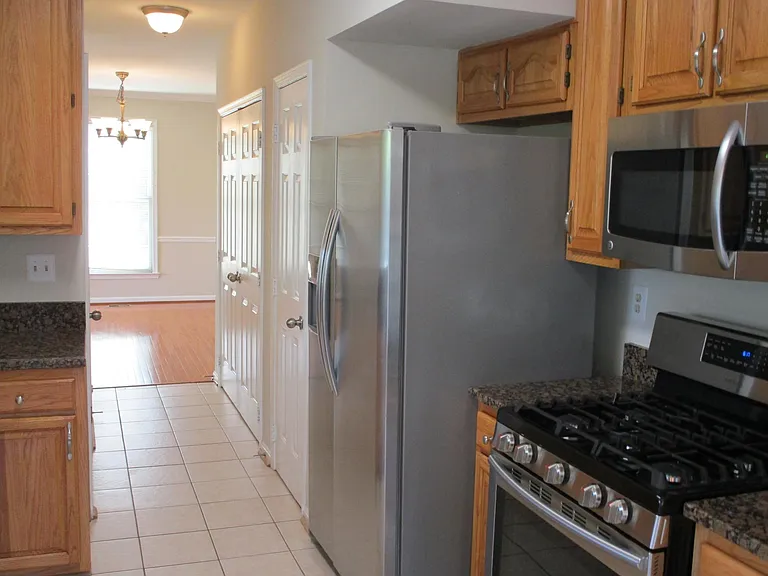 Kitchen Hallway to Powder Room and Laundry Area