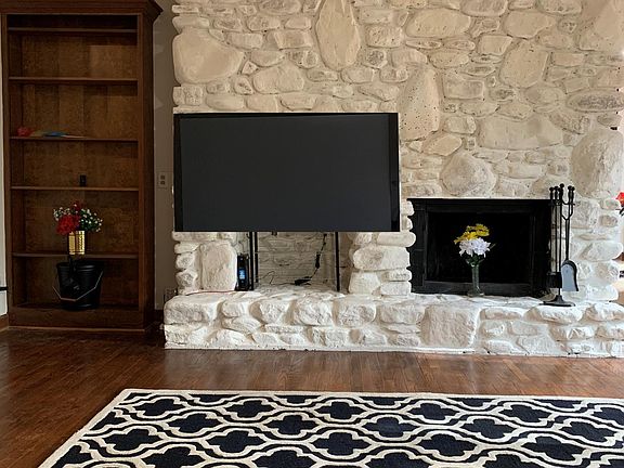 In most cases, we can supply the stone-mounted VESA TV mount for safely installing a 35-65 inch diagonal flat screen TV up to 80 lbs. There is a cubbyhole shown where the AT&T, Google Fiber, Spectrum TV/INTERNET is available