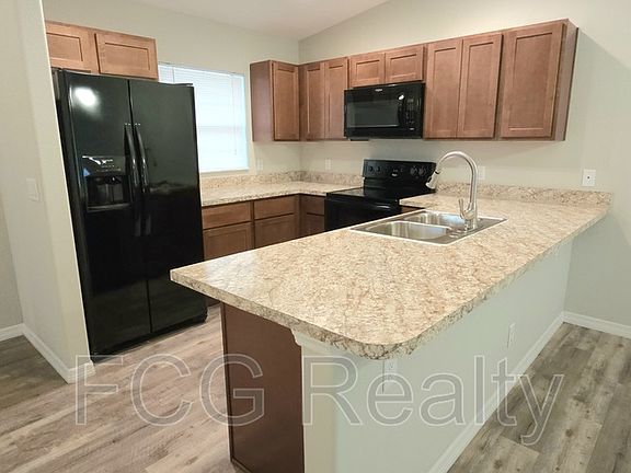 2nd image of 9385 N Peachtree Way