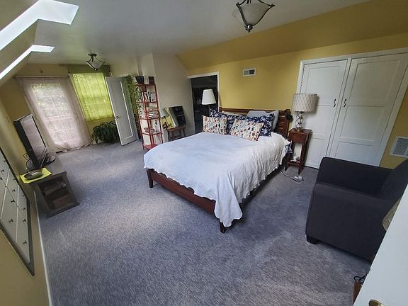 Bedroom with walk in closet and 1 bath. Outdoor exit