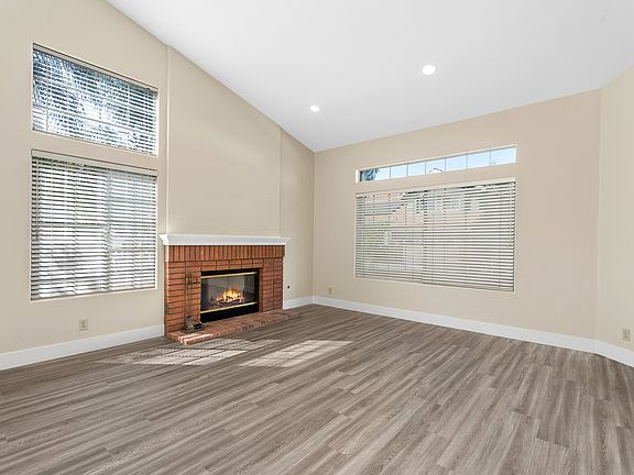 Bright and airy, with new LVP flooring and recessed lighting.