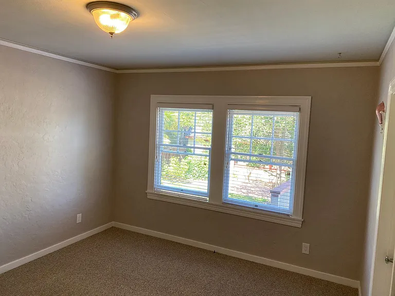 Main bedroom, lots of natural light.