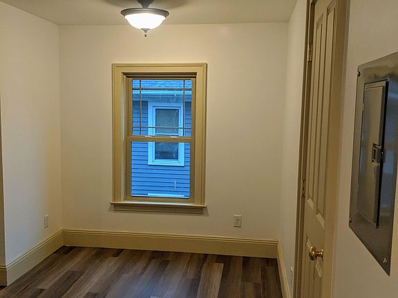 dining room, kitchen is on left and pantry is on right. window faces north