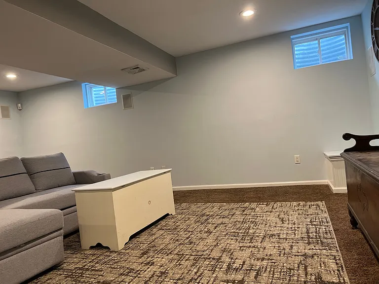 Living area with very limited lightening-but spacious. Windows do open for fresh air.
