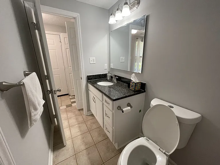 High end fixtures throughout. Not pictured to left - additional storage inside water heater closet.