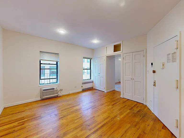 300 1/2 E 65th St #4 — Photo 1