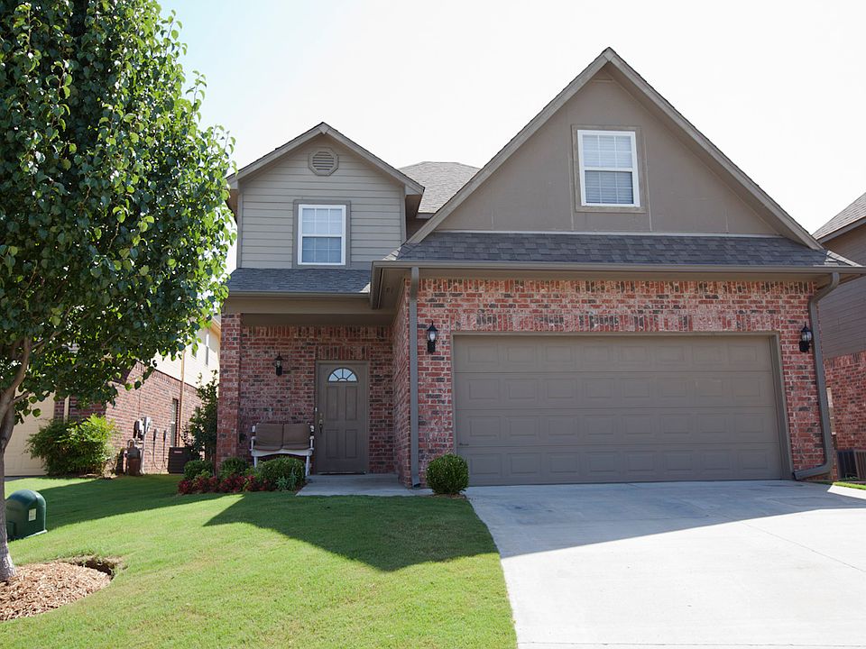 Exterior front landscaped, 2 car garage