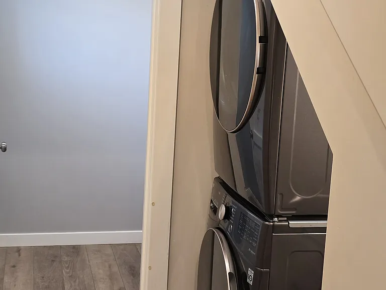 Full size washer/dryer under staircase