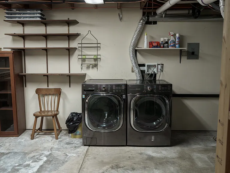 unfinished storage/laundry/work bench