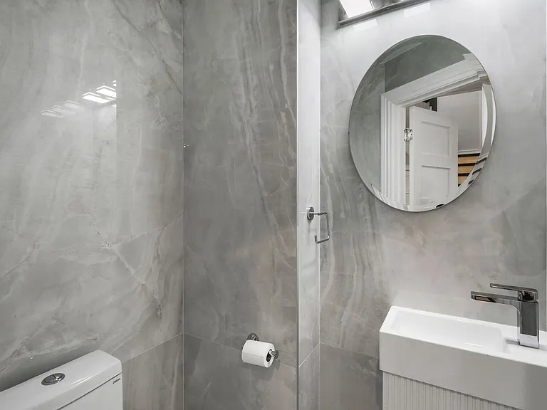 white onyx porcelain designer tiles 4 x 8 sheets; floor tiled with same material