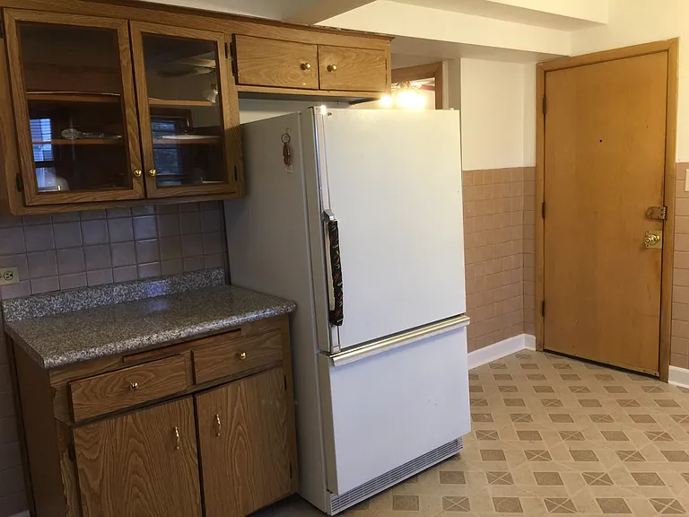 Kitchen plus rear entry door