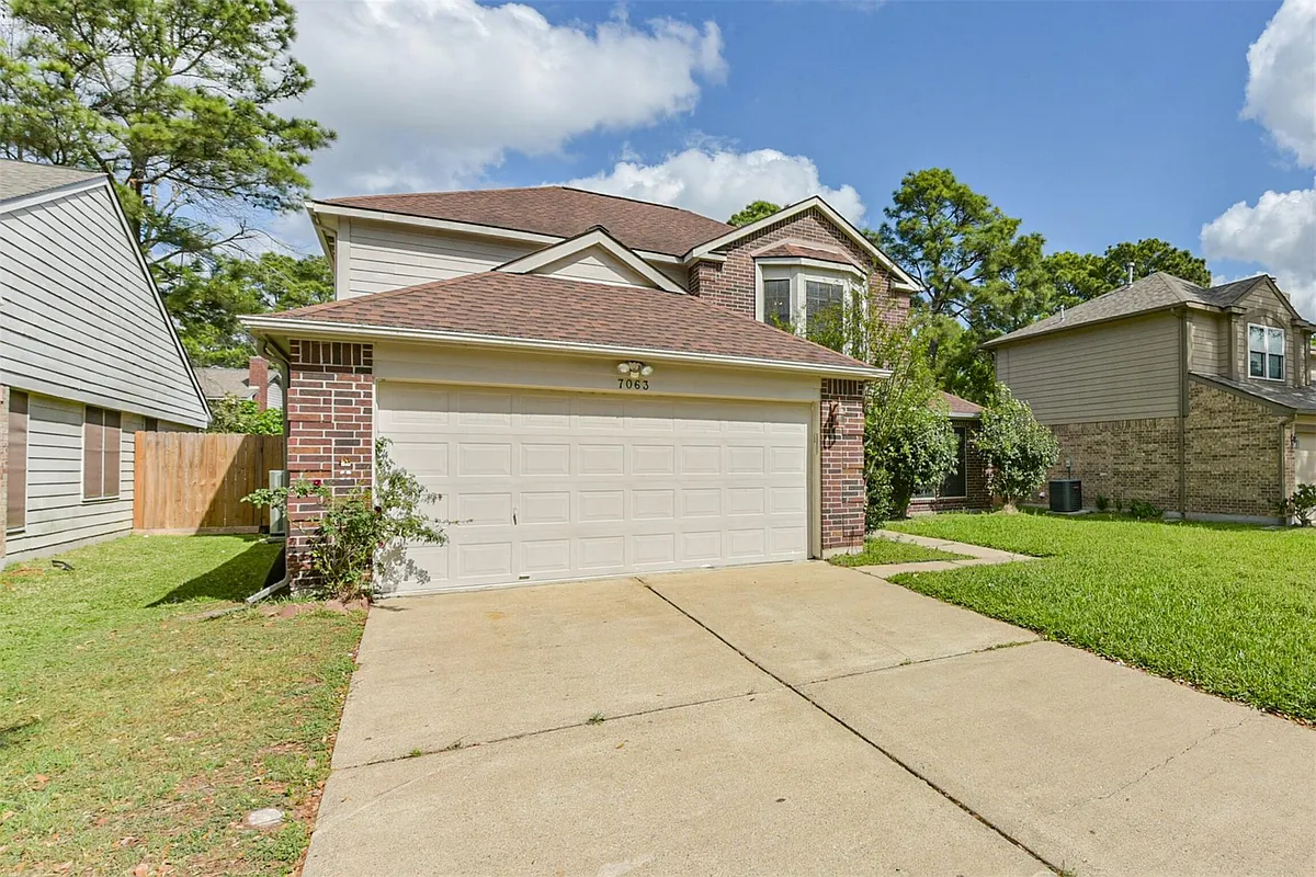 Building Photo - 7063 River Garden Dr