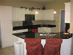 This kitchen has Stainless Steel Appliances, Granite Countertop