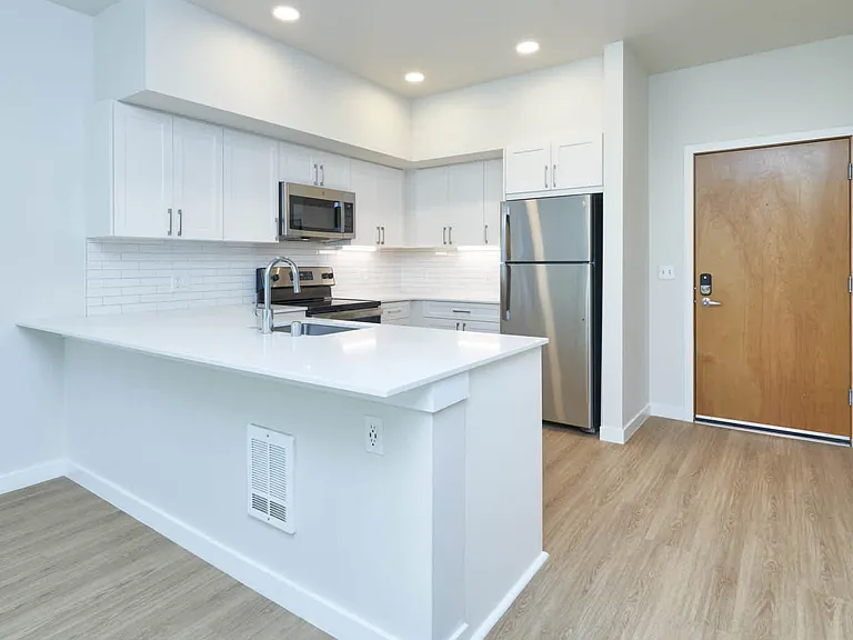 Kitchen with Stainless Steel Appliances and Breakfast Bar