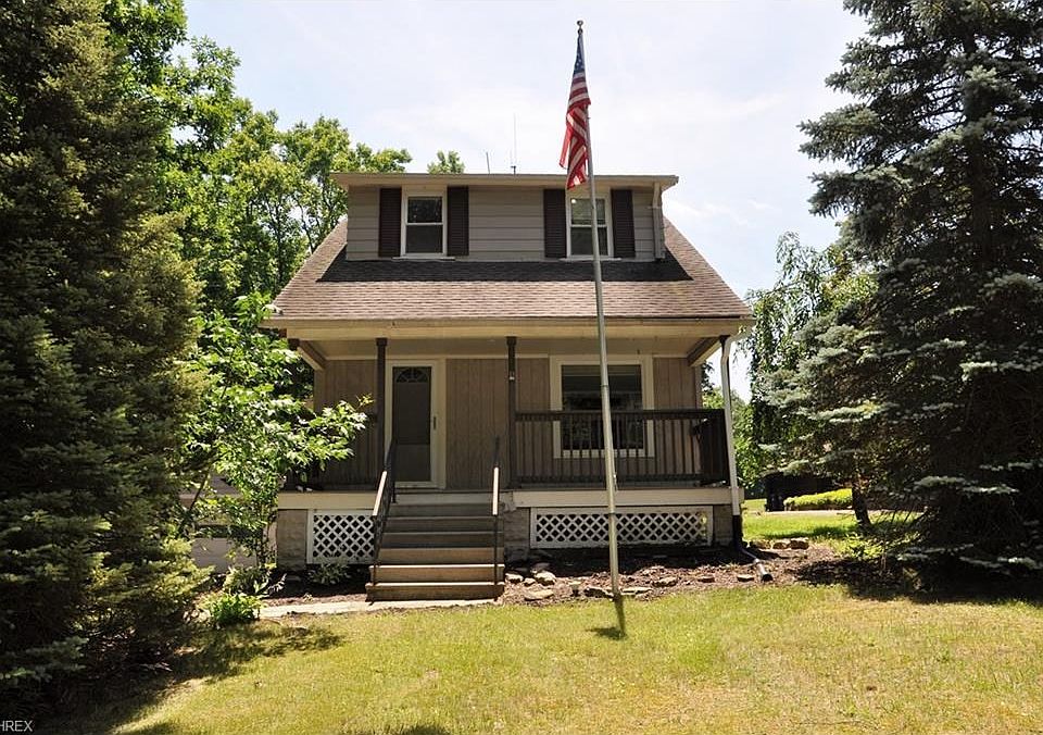 Welcome Home to 8016 Stone Rd. A Nature Lover's Paradise - over 3/4 wooded acres next to the Cuyahoga Valley National Park!