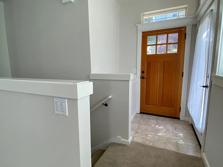 entry and stairs to garage