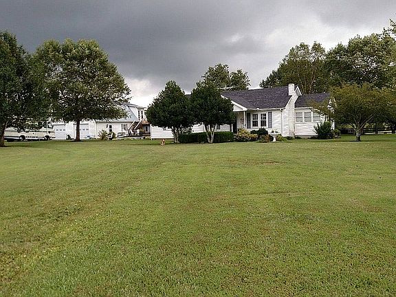 Front yard. View from road.