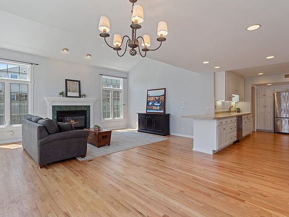 Family room opens to the kitchen and breakfast room.