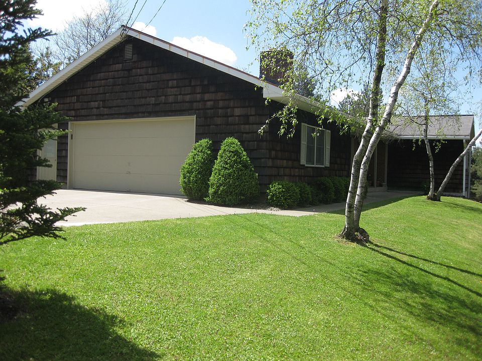 2 1/2 Car Attached Garage and Driveway