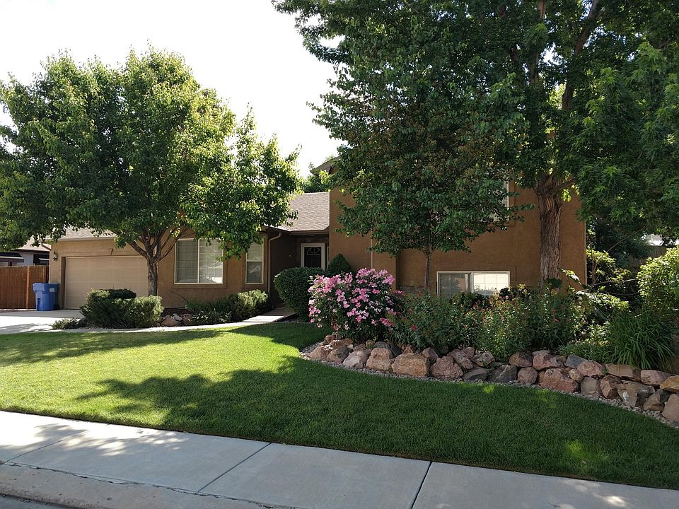 Front lawn with front entrance in background