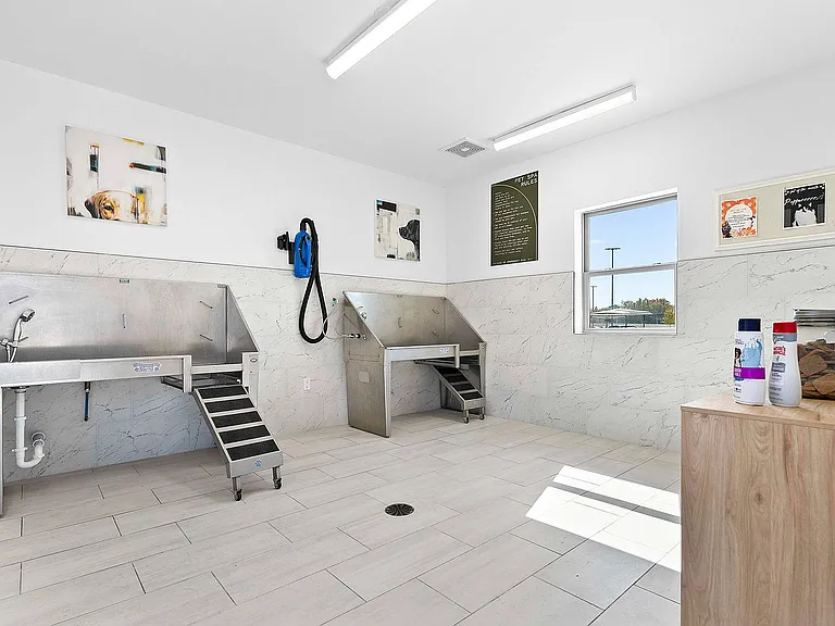 Explore our dedicated pet washing station, designed for convenience and style.