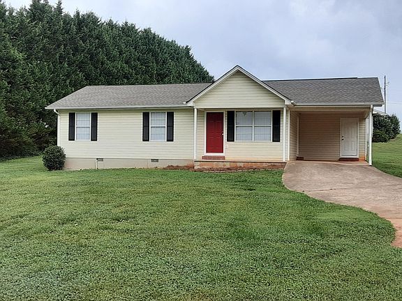 Front of house with large front yard