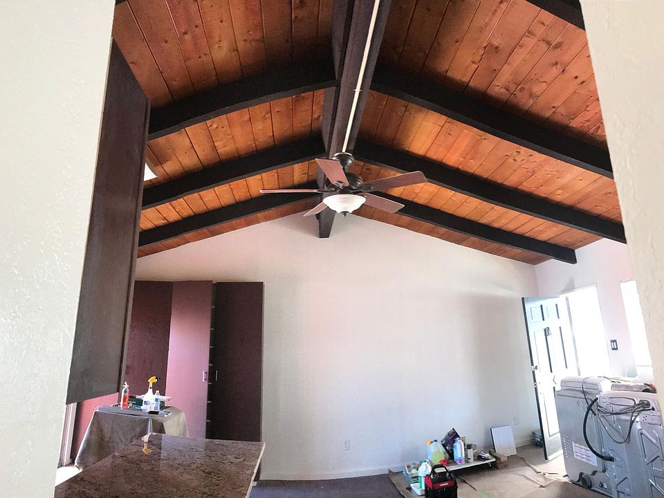 Vaulted ceiling with fan living room