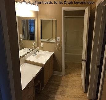 Second Bath w/toilet & tub beyond door