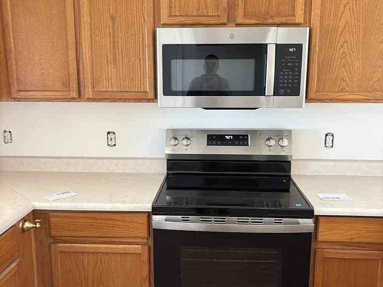 New Range and Microwave - The outlet plates are in the process of being replaced
