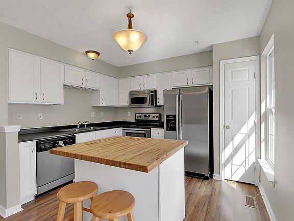 White cabinets with SS appl