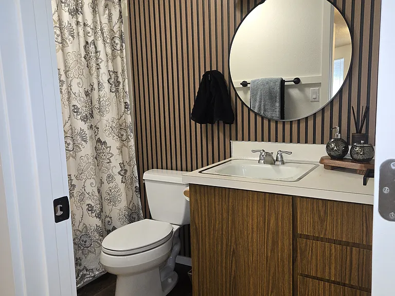 Shower curtain, rug and staging items not included.