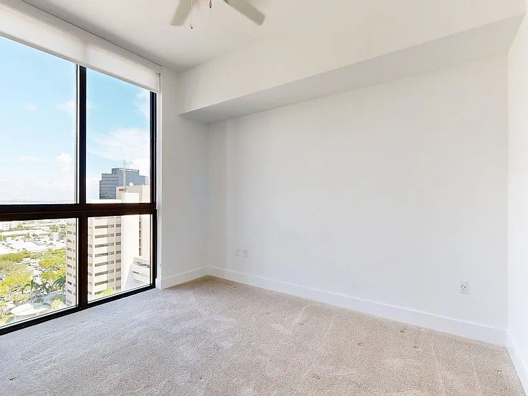 Spacious apartment Bedroom with Carpet Floor.