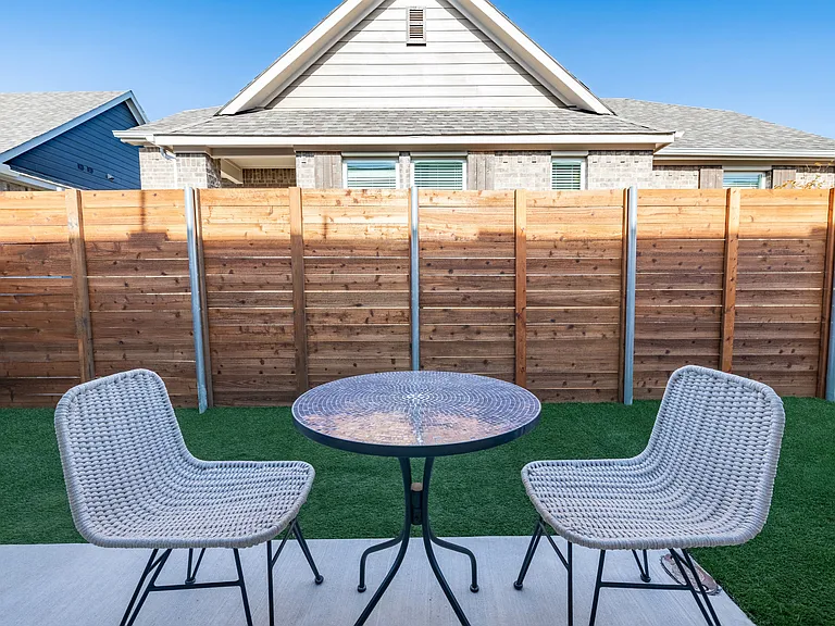 Amavi Celina provides you with the perfect backyard featuring lush turf grass.
