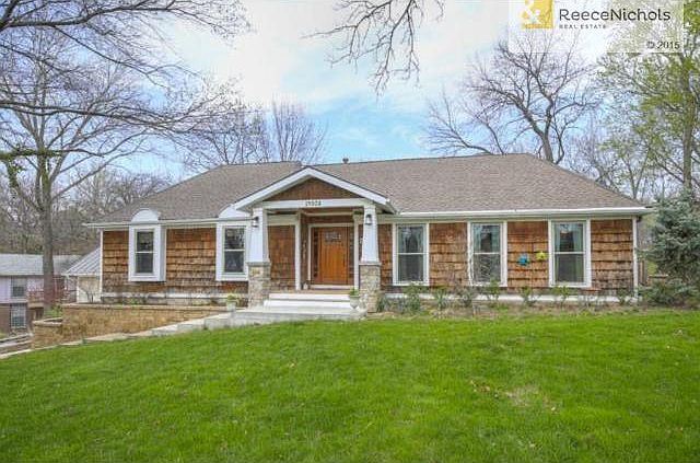ALL NEW FRONT EXTERIOR w/stone posts, custom front door, new fro