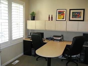 Office with Built In Dual WorkCenter & Maple Bookcases
