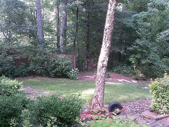 3/4 acre fenced back yard