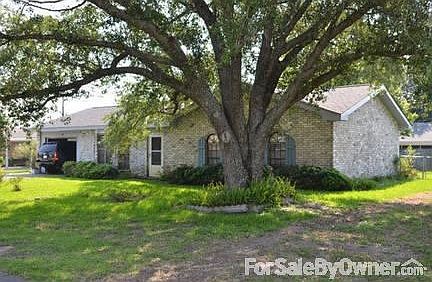 212 Louisa Street
						:
						Beautiful oak tree in front yard. Low maintenance brick & vinyl exterior