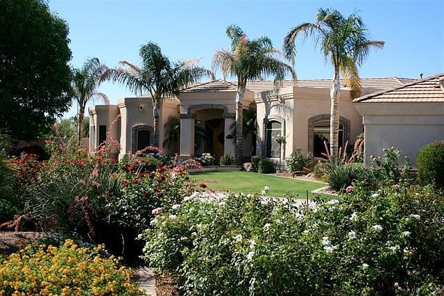 Located on .81 acre irrigated lot