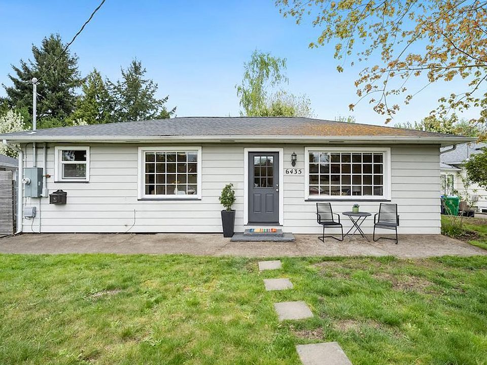 Our home is a cute ranch, built in 1926. Look at all those huge windows! If you love light & bright spaces, you will enjoy this home!