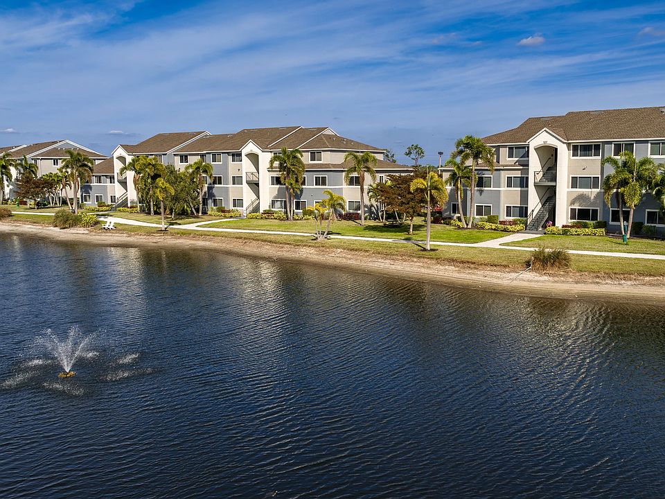 Discover the beauty of lakeside living at Lexington Palms, featuring stunning exteriors and a relaxing atmosphere.