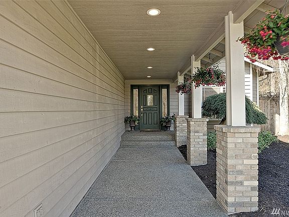 Charming covered patio to front door