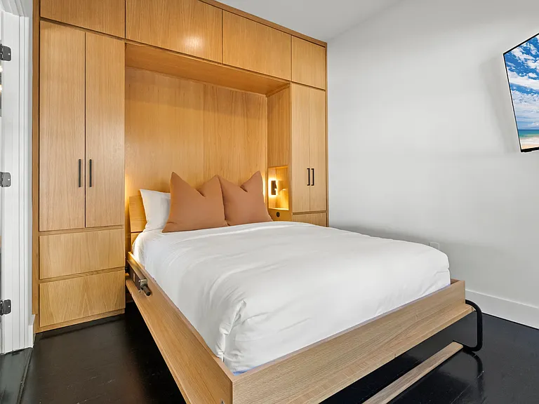 Complete with a modern Murphy bed that maximizes space without compromising style.