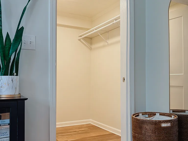 Spacious walk-in closet, with additional shelving available
