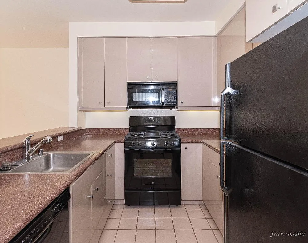 A Step Above All The Others! Marina condo with 9' ceilings! — Photo 2