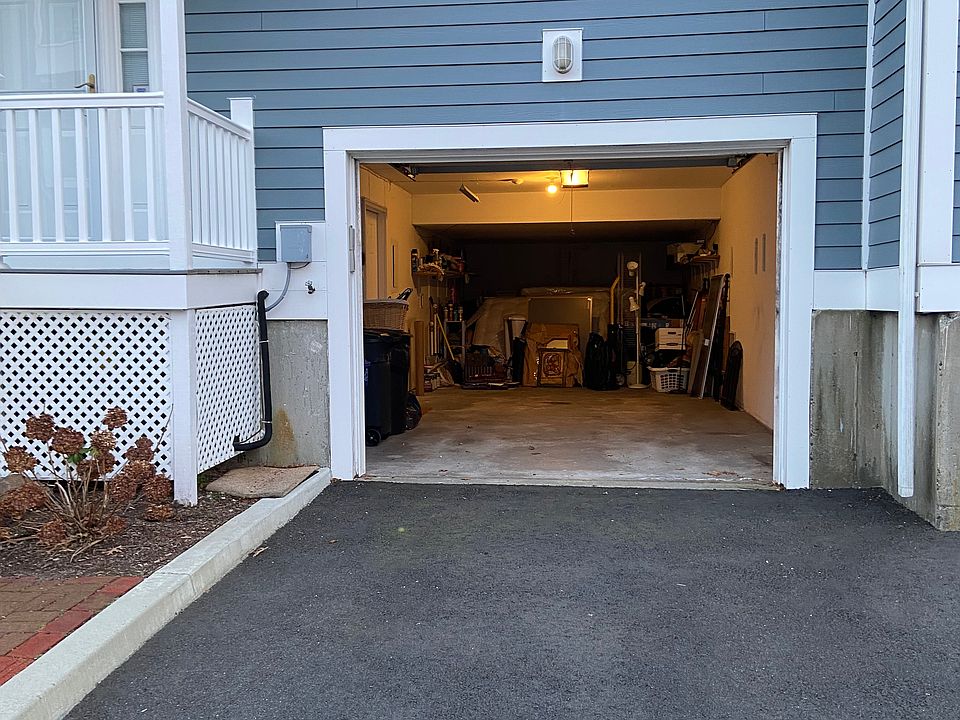 Attached, one car garage provides direct access to unit