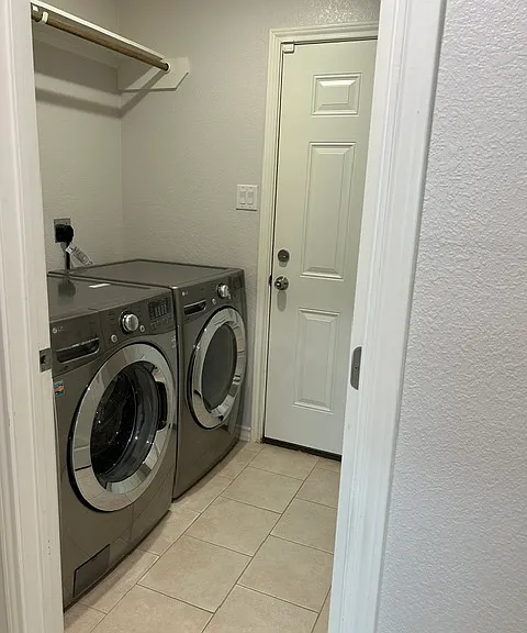 laundry room, and side entrance to back yard