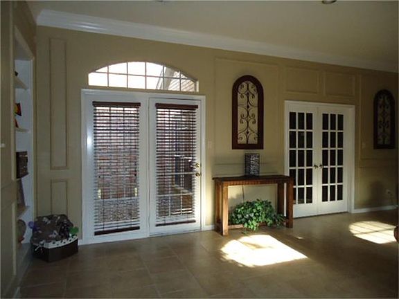 Looking from formal dining into living area with view to Atrium