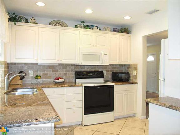4th image of 4451 NW 6th Ct