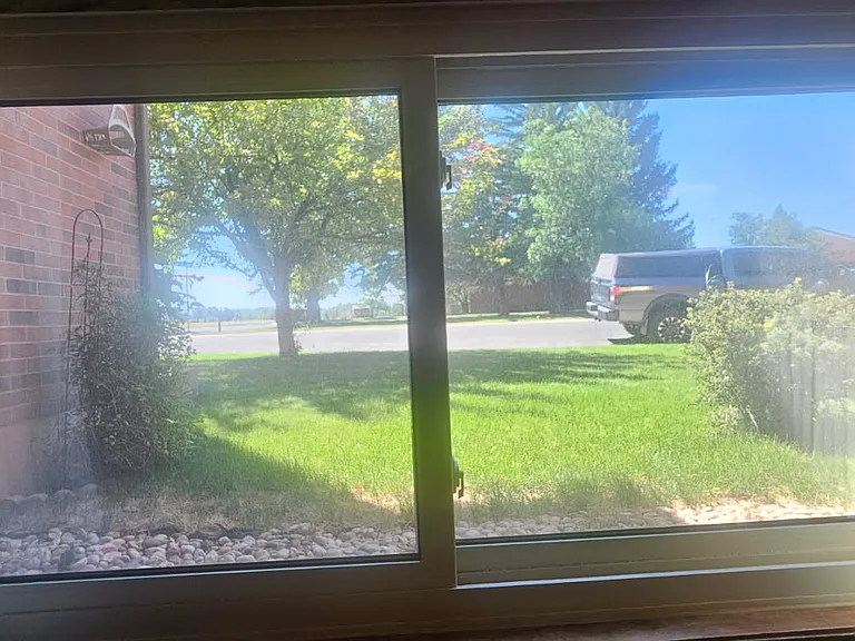 view outside to street parking from living room