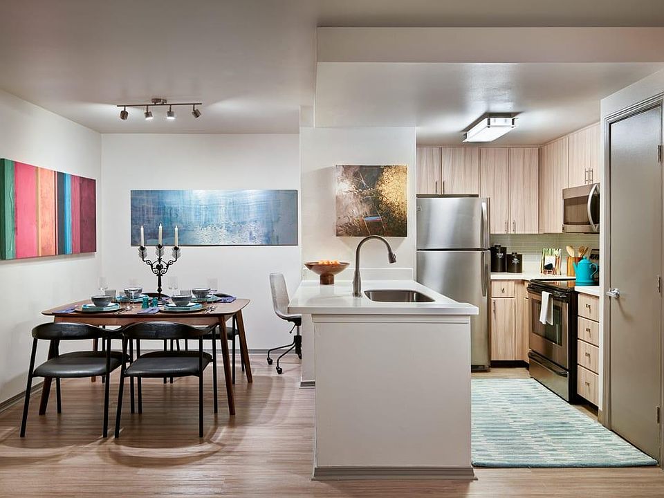 Modern kitchen with stainless steel appliances at Griffis North Creek